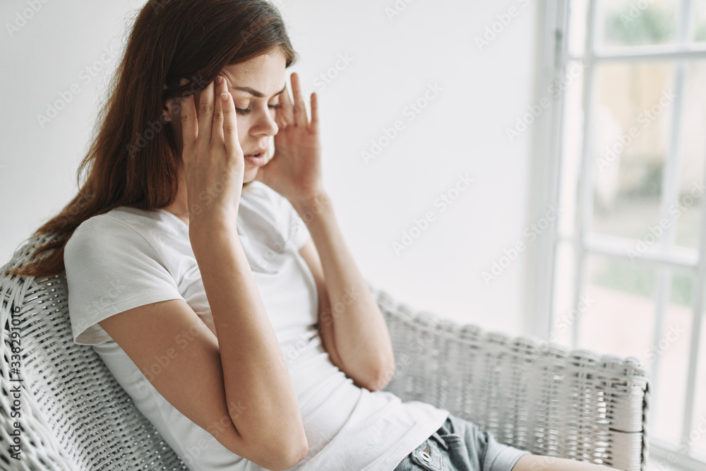 young woman sitting on the sofa young woman sitting on the sofa