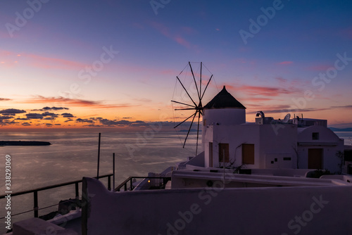 Windmill in Oia, Santorini, Greece, at Sunset