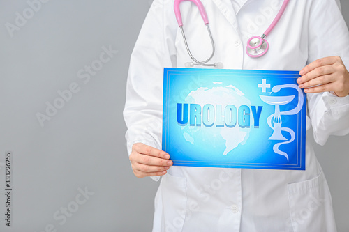 Doctor holding paper with w...