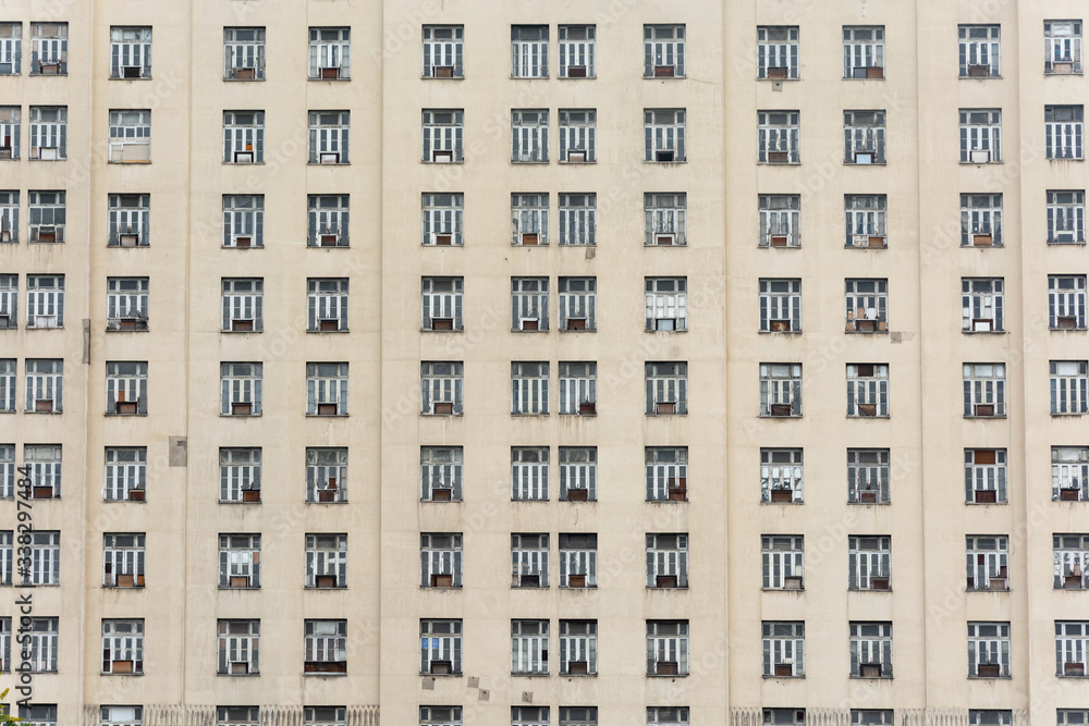 Close up of art deco building facade with windows pattern in Rio de Janeiro, Brazil