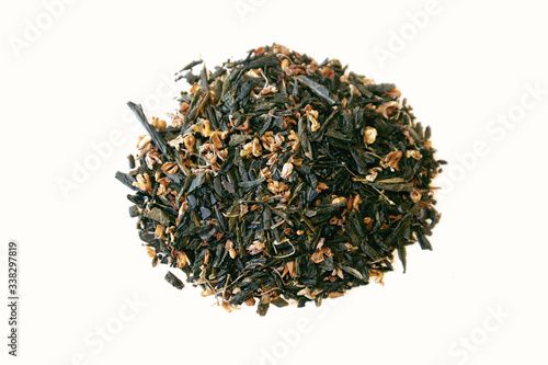 pile of dried green tea leaves
