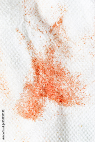 blood stains on a white napkin