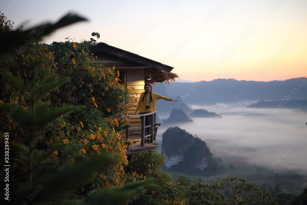 Fototapeta premium Women enjoy the view of Phu Lanka in the morning in Phayao, Thailand
