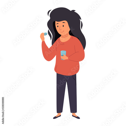 A woman is drinking medicine. She holds a pill and a glass of water in her hands