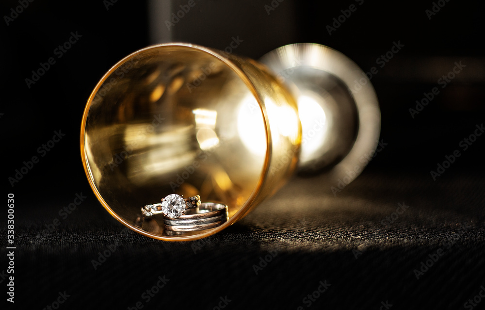Two training rings in a glass Two training rings in a glass