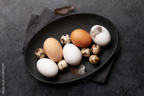 White, brown and quail eggs