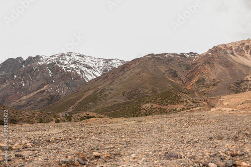 Mountain landscape during winter in Lo Valdés Valley, Cajón del Maipo, Central Andes of Chile.