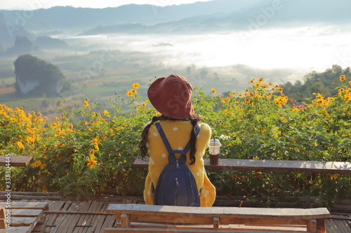 Women enjoy the view of Phu Lanka in the morning in Phayao, Thailand.