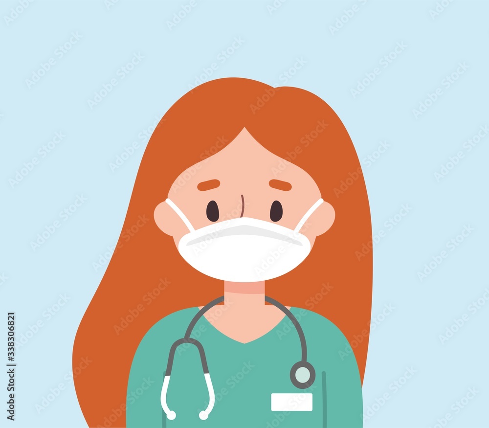 Female doctor with red hair wearing scrubs and a mask Female doctor with red hair wearing scrubs and a mask