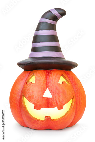 Halloween pumpkin with witch hat. Isolated on white background with natural shadow. With light inside. Shining pumpkin with witch's hat.