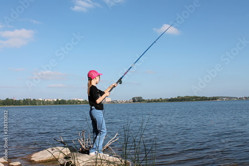 man fishing on the lake