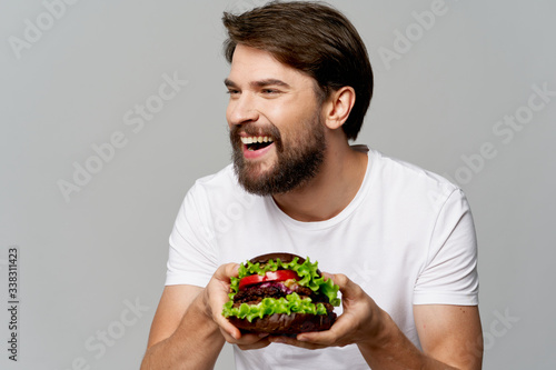 young man eating a sandwich