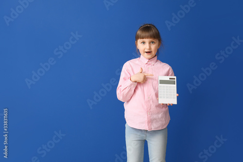 Little girl with calculator...