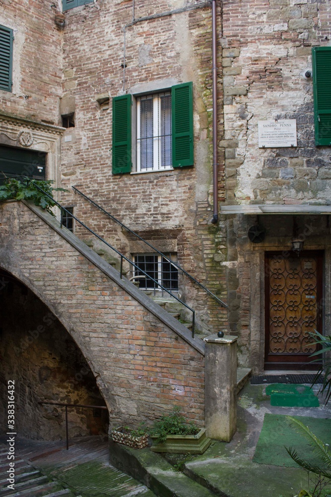 Ancient stone house in Perugia historic city centre, Italy