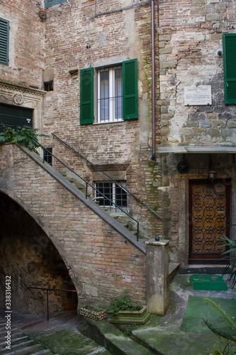 Fototapeta Naklejka Na Ścianę i Meble -  Ancient stone house in Perugia historic city centre, Italy