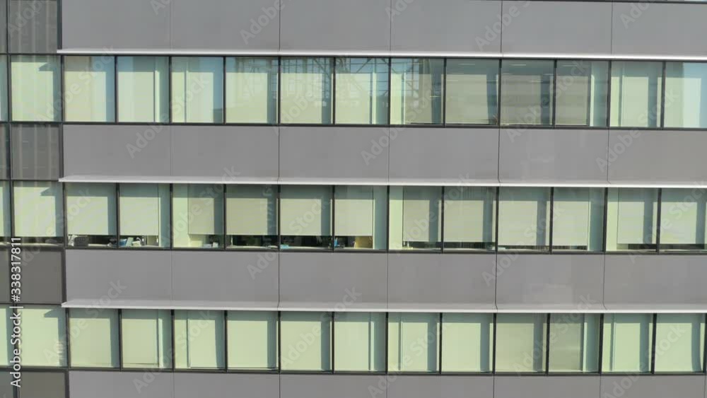A view of the glass windows of the buildings in Tokyo Japan A view of the glass windows of the buildings in Tokyo Japan