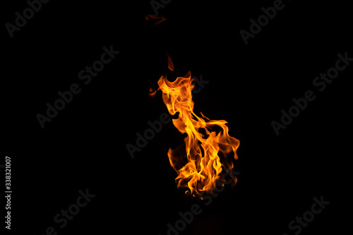 Bright fire. Tongues of flame. Beautiful background with fire © Simon