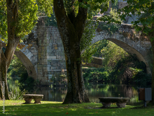 Detail view of the romanesque Vilanova bridge in Allariz, Galicia, Spain photo