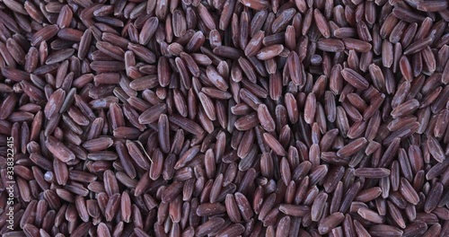 Rotation of dry raw unpolished brown rice
