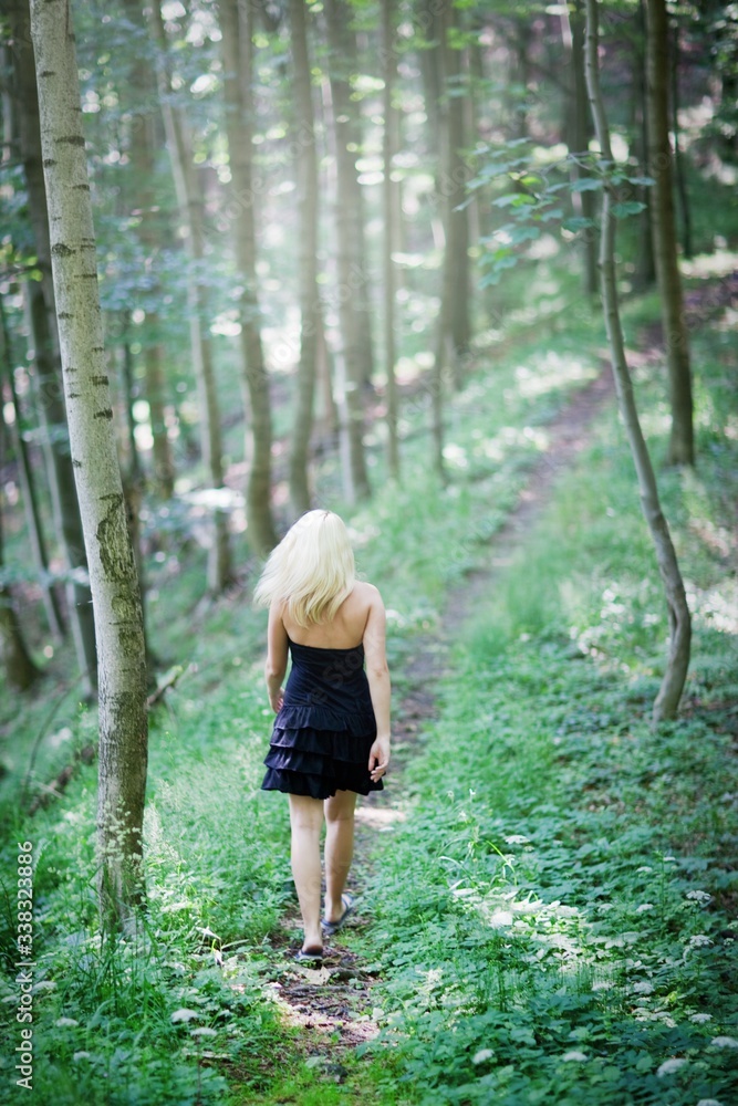Beautiful young woman in exterior, no face. Amazing sunny day. Beautiful young woman in exterior, no face. Amazing sunny day.