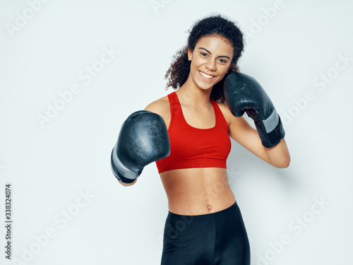woman with boxing gloves © SHOTPRIME STUDIO