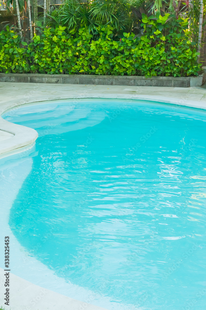 Pool without people with blue water