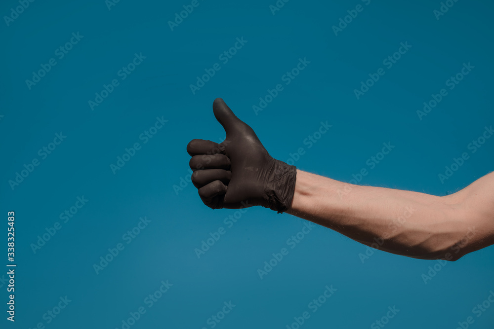 hand of a man. Gloves. COVID-19 hand of a man. Gloves. COVID-19