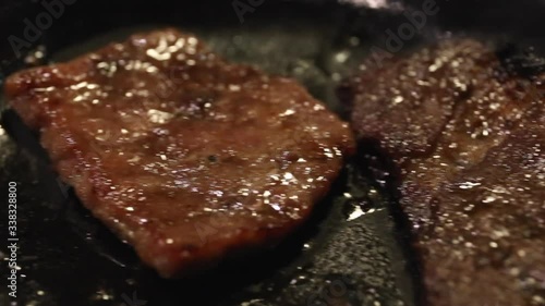Japanese beef grill on metal pan close up and pan shot