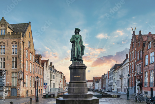 Bruges, Belgium - February 2018: Statue of the Flemish painter Jan van Eyck in Bruges.