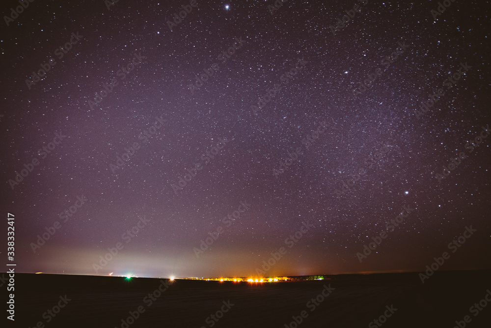 Real Night Sky Stars Background With Natural Colourful Sky Gradient. Sunset, Sunrise Light And Starry Sky Over Horizon