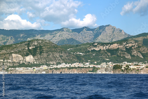 Sorrentine Peninsula - Italy: Panoramic view of the coastline from the sea.