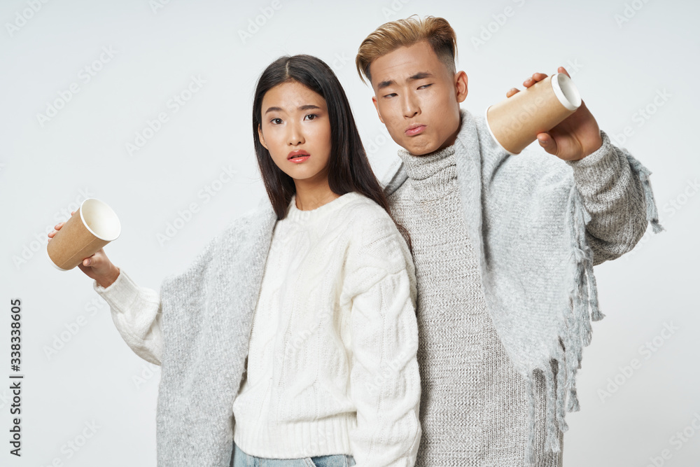 happy young people holding a credit card happy young people holding a credit card