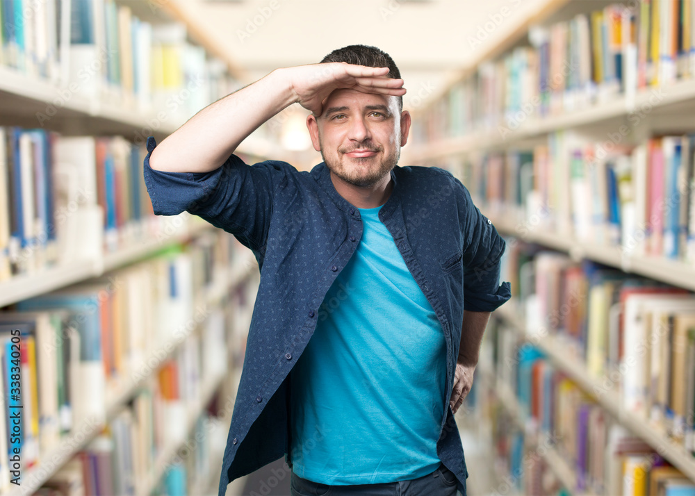 Young man wearing a blue outfit. Looking into the horizon. Young man wearing a blue outfit. Looking into the horizon.