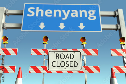 Traffic barricades near Shenyang city traffic sign. Coronavirus disease quarantine or lockdown in China conceptual 3D rendering © Alexey Novikov
