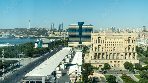 Baku, Azerbaijan - July 2019: Baku cityscape with Caspian Sea, Flame Towers and car traffic