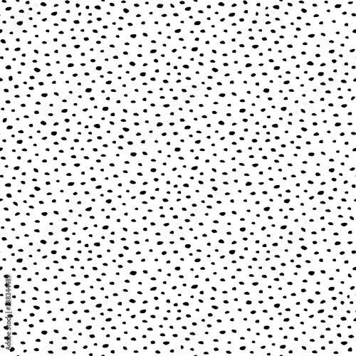 Background polka dot. Seamless pattern. Random dots, snowflakes, circles. Design for fabric, wallpaper. Irregular chaotic abstract texture with messy dots tiled. Repeating hand drawn chaotic dots