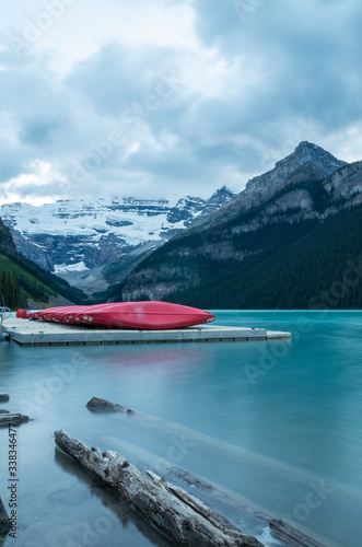 Red Canoes on pontoon at Lake Louise, Canada