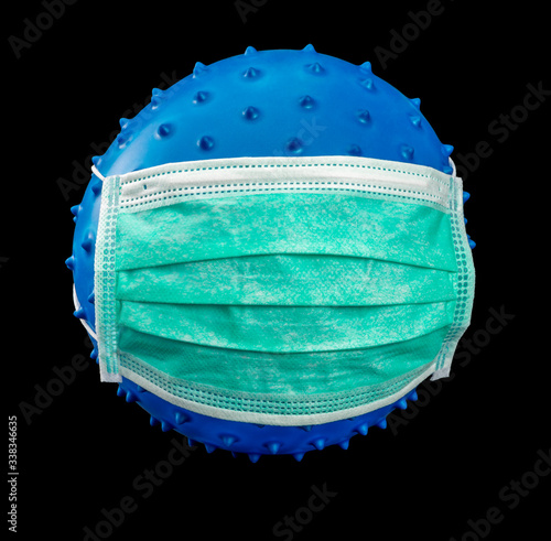 symbolic virus with face mask photo