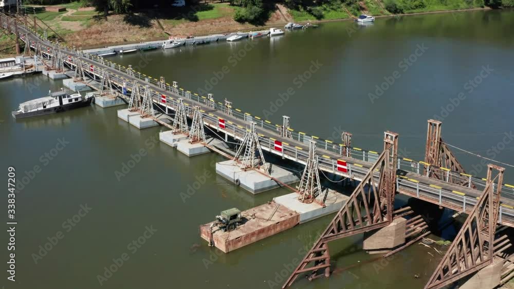 Pontoon wooden bridge over the Tisza river, aerial shot in summer Csongrad, Hungary.