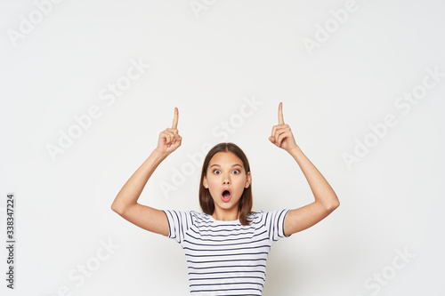 happy young woman with hands up
