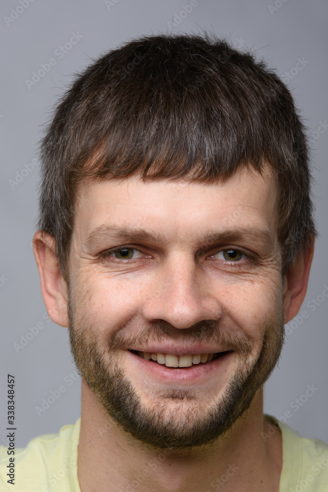 Fototapeta premium The closeup portrait of a happy man
