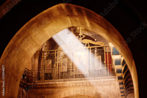 Interior of the Church of the holy sepulchre in Jerusalem, Israel, with ray of light