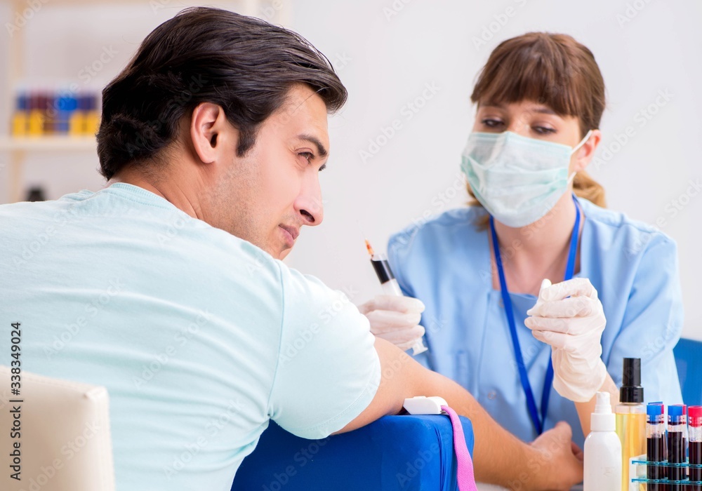 Young patient during blood test sampling procedure Young patient during blood test sampling procedure