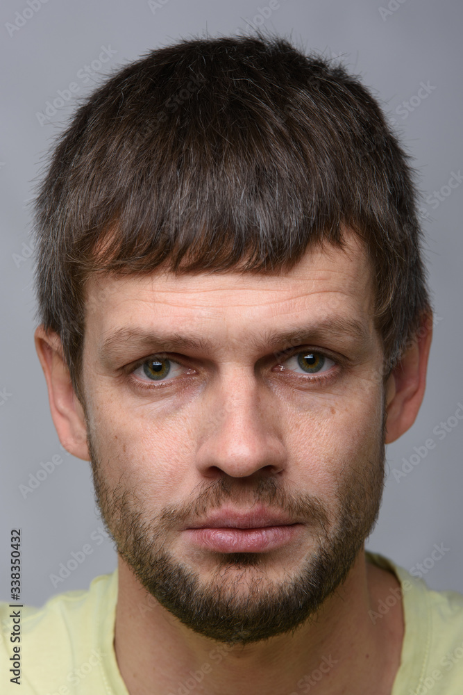 Closeup portrait of an upset crying man of European appearance Closeup portrait of an upset crying man of European appearance