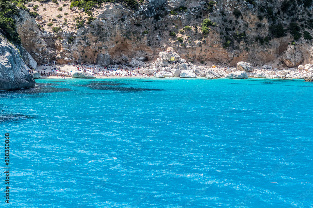 The beach of Cala Goloritze in Sardinia with turquoise water (Gulf of Ororsei)