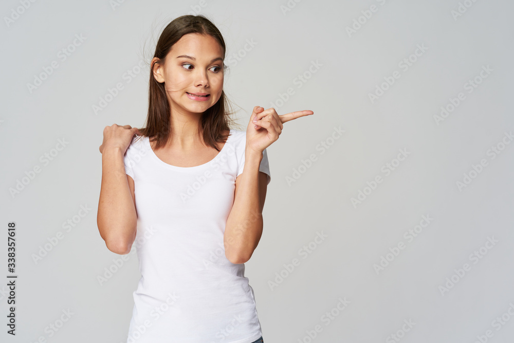 woman pointing at copy space woman pointing at copy space
