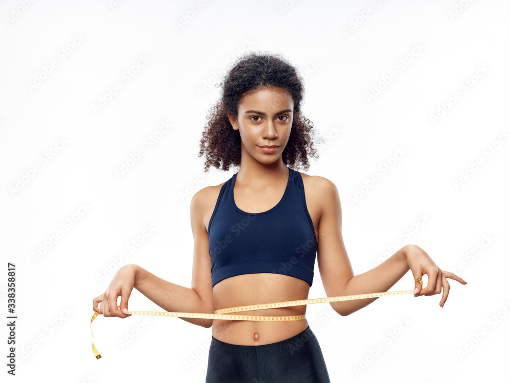 woman measuring waist