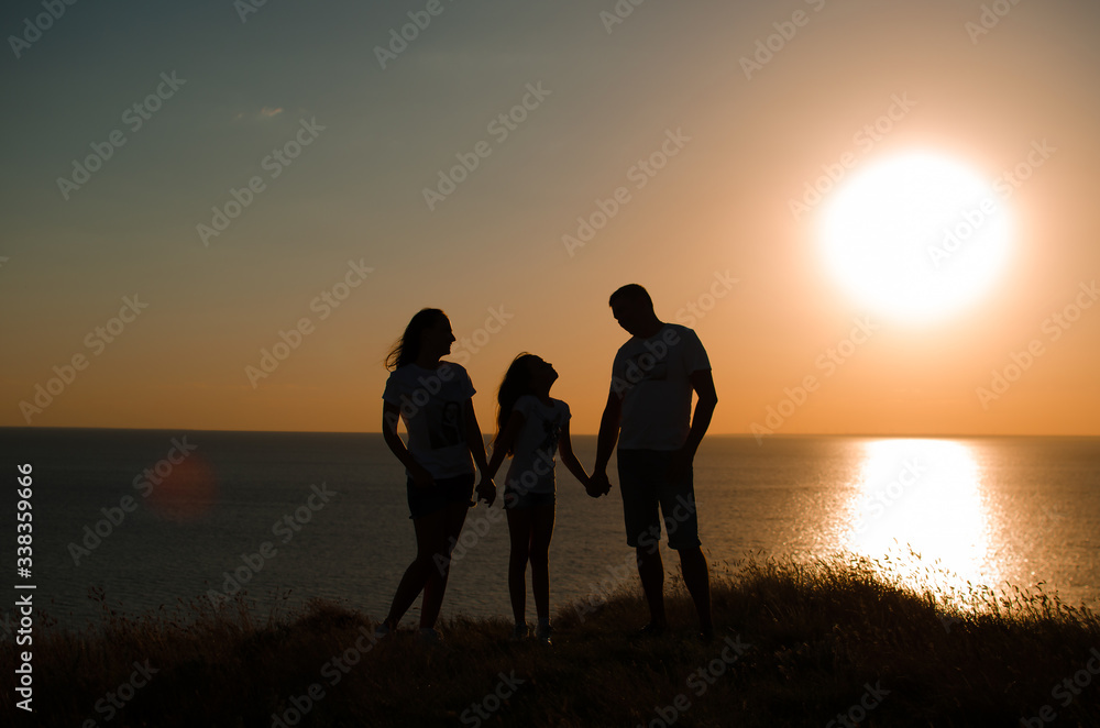 happy family in sunset
