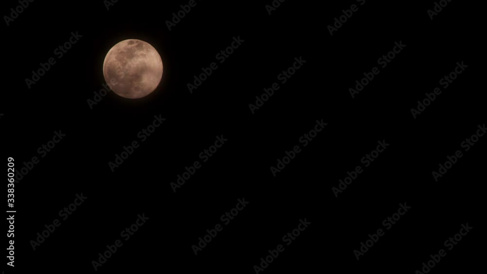 timelapse of a moving full moon with clouds timelapse of a moving full moon with clouds