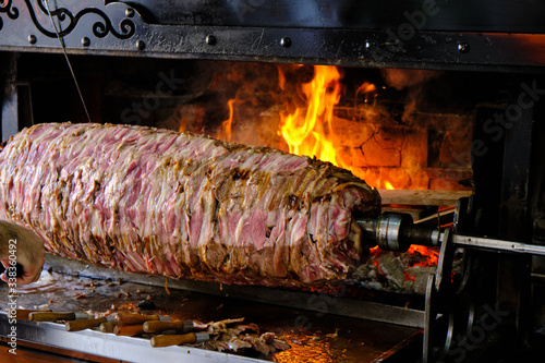 Photography Cag Kebap, Traditional Turkish Kebap being prepared by chef
